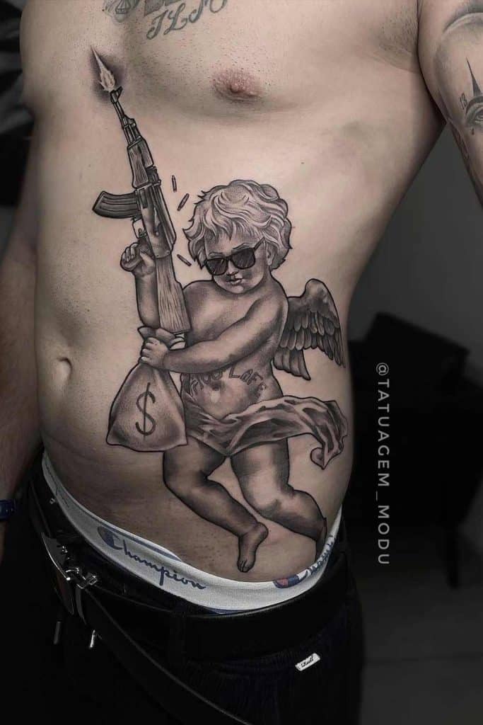 tatuagens na cintura mais bonitas e perfeitas anjo armado