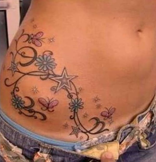 tatuagens na cintura mais bonitas e perfeitas floral tribal