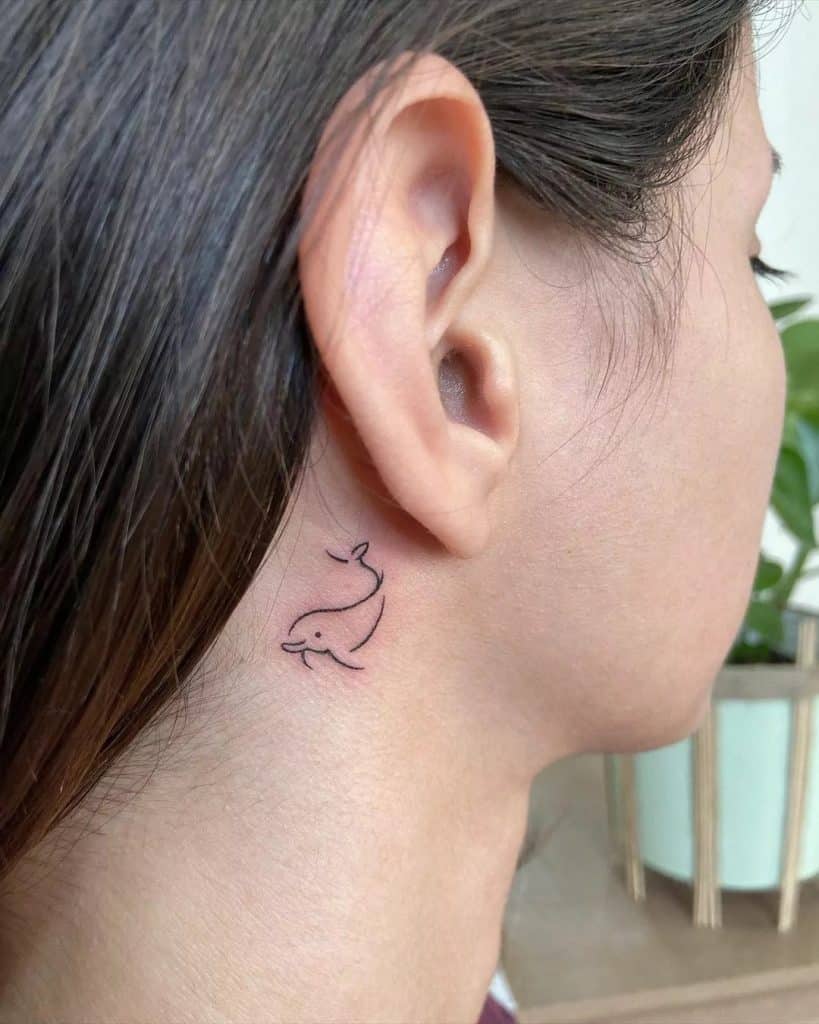 tatuagens no pescoço femininas lindas e delicadas golfinhos