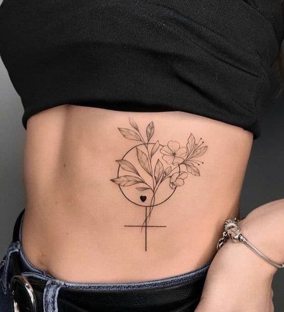 as melhores tatuagens femininas na costela ramo de flores circulo