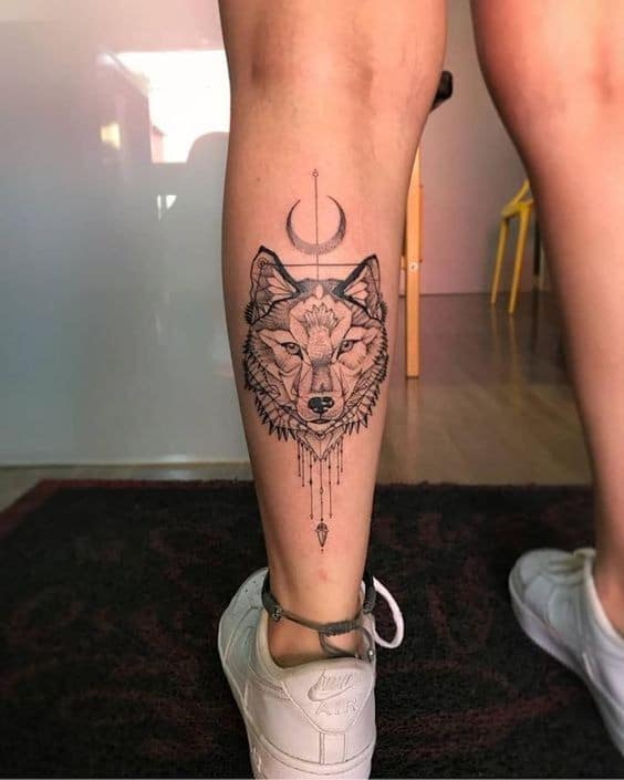 as tatuagens na canela mais bonitas atualmente lobo