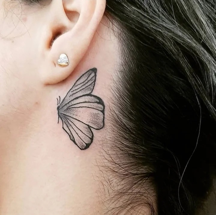 conheça as implicações sociais e profissionais da tatuagem no pescoço borboleta