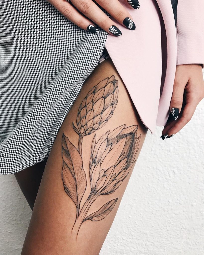 conheça as principais considerações ao escolher a tatuagem na perna flor