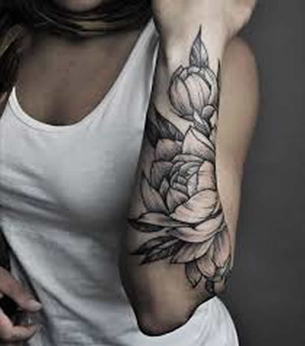 descubra como escolher a tatuagem no braço feminina perfeita floral