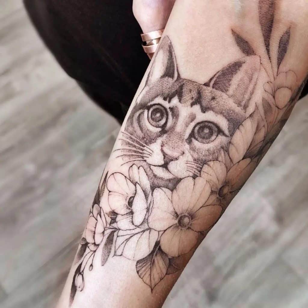 melhores e mais bonitas tattoos no antebraço gatoe floral