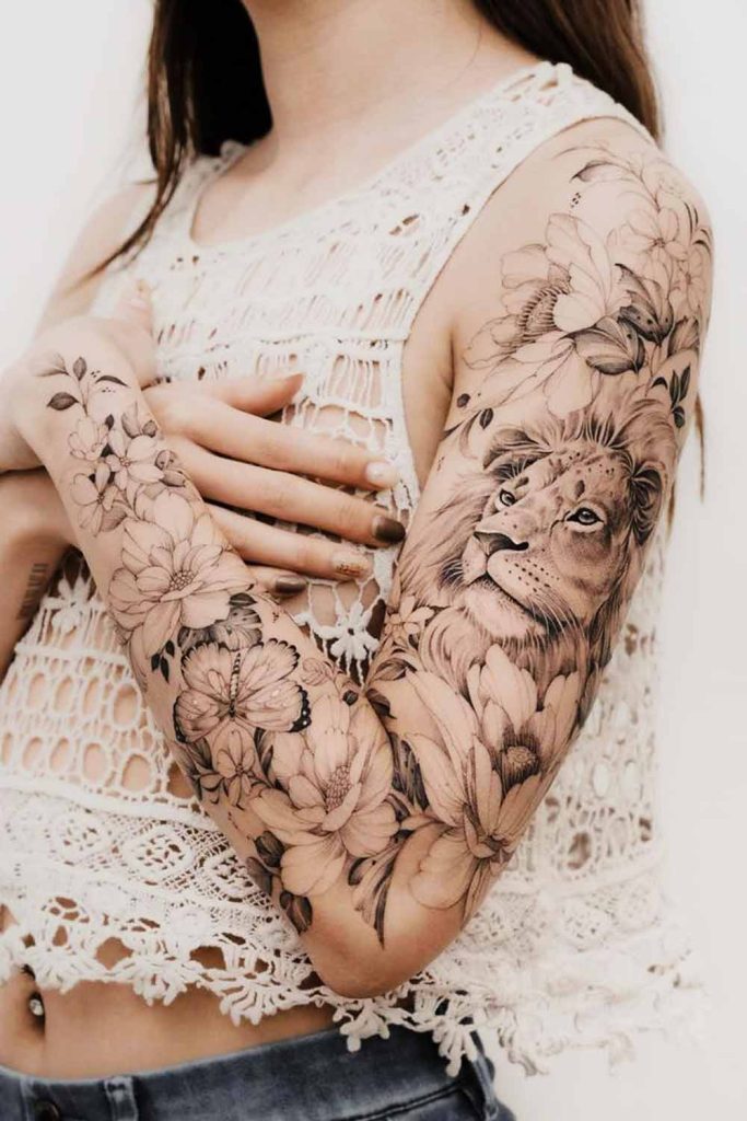 tatuagens no braço expressão artística criativa com significado pessoal e cultural floral e leão