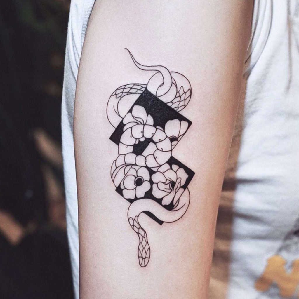 exploring the unique and versatile world of negative space tattoos snake