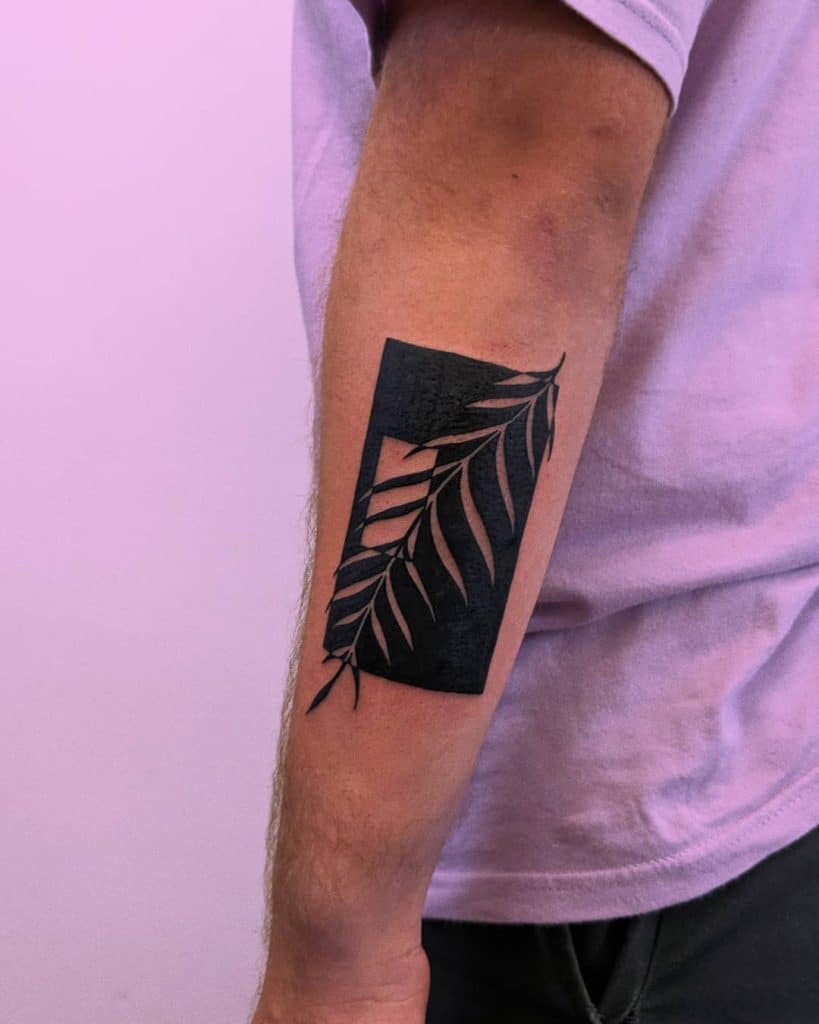 exploring the unique and versatile world of negative space tattoos branch