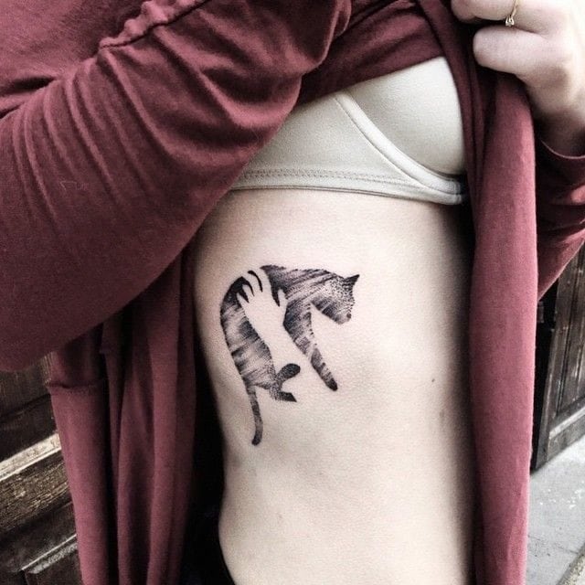 exploring the unique and versatile world of negative space tattoos cat