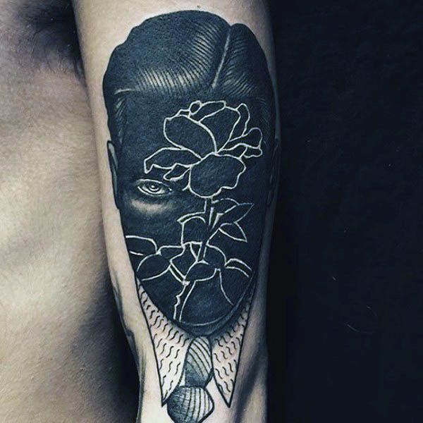 exploring the unique and versatile world of negative space tattoos face