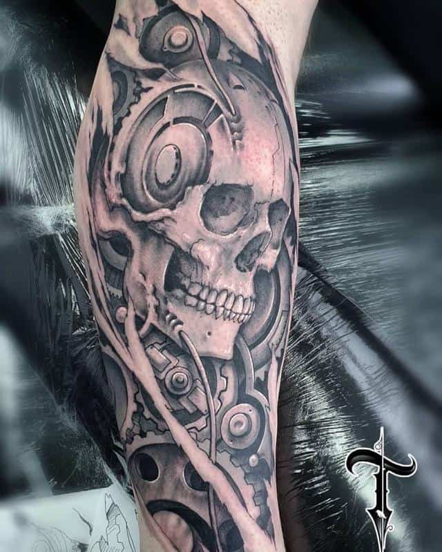 exploring the world of biomechanical tattoos a unique style of ink skull