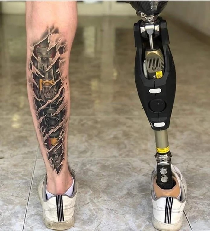 exploring the world of biomechanical tattoos a unique style of ink leg