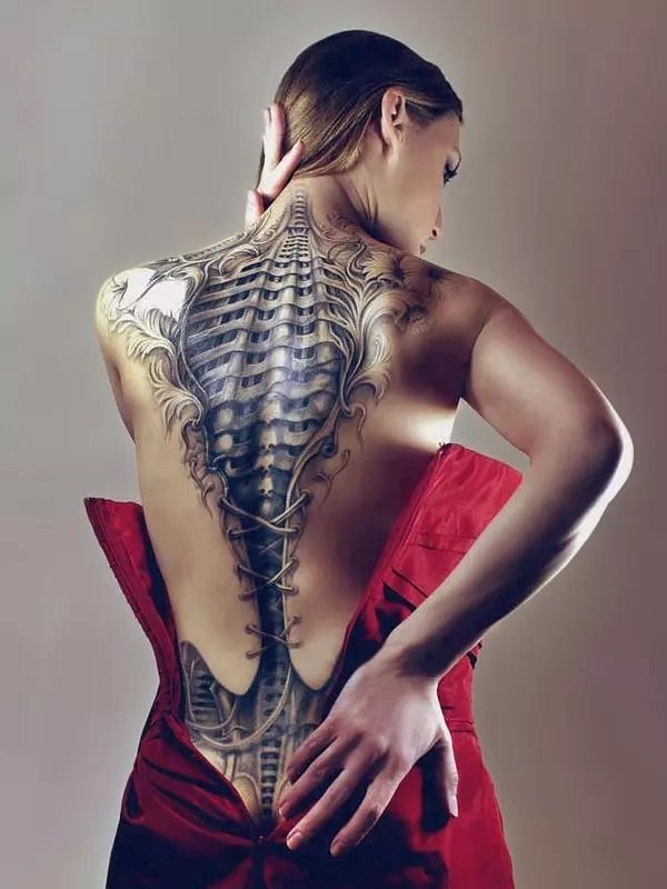 exploring the world of biomechanical tattoos a unique style of ink skin