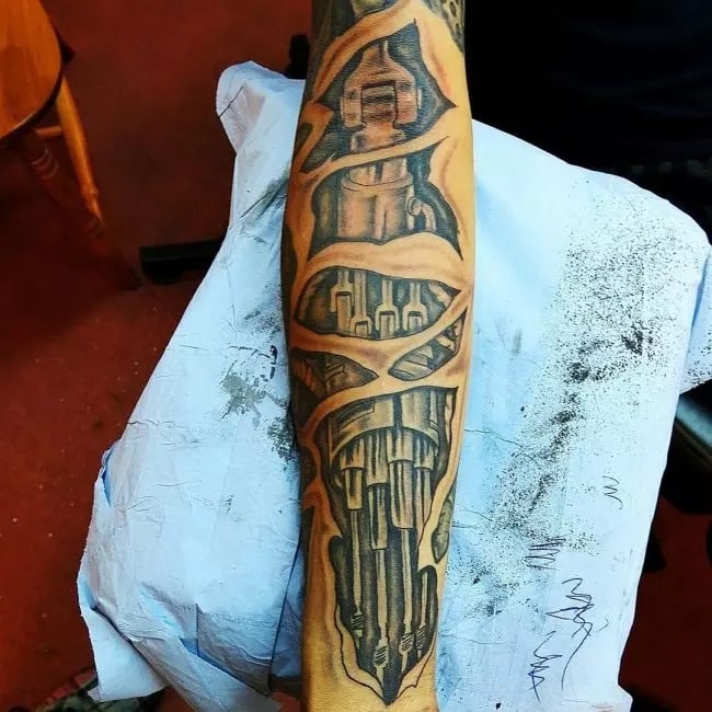 exploring the world of biomechanical tattoos a unique style of ink