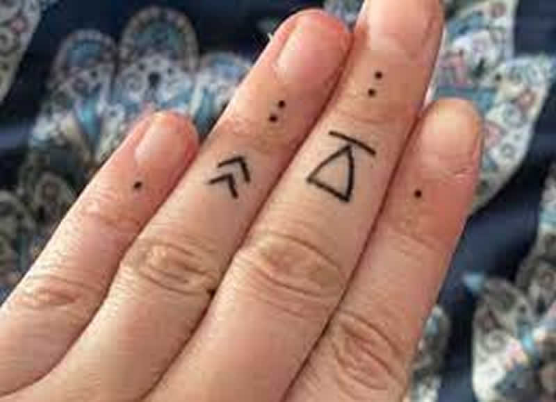 hand poked tattoos a unique and personal form of self expression finger
