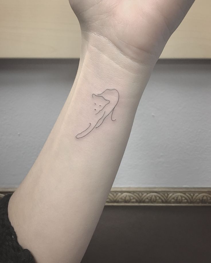 line art tattoos simple, versatile, and affordable cat