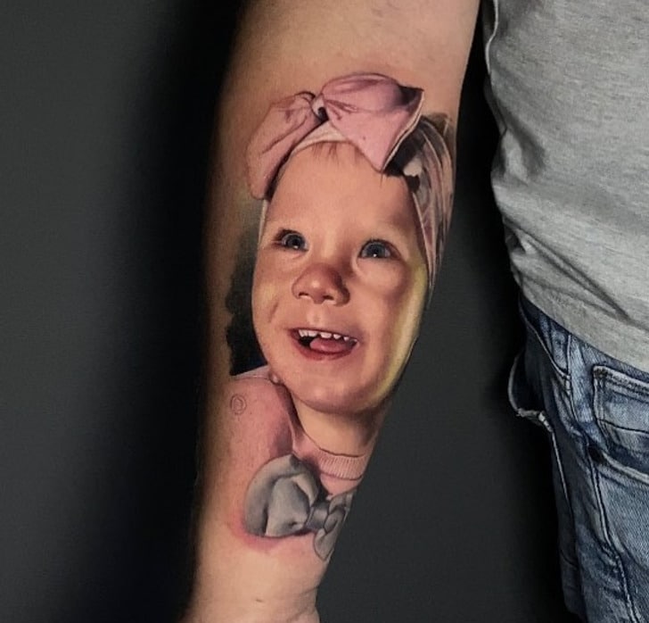 portrait tattoos capturing the essence of the subject baby