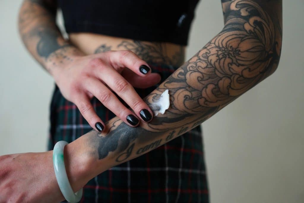 proper tattoo aftercare tips to keep your ink vibrant and infection free cream