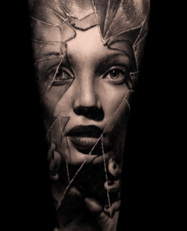 realism tattoo style creating striking and lifelike tattoos black and grey glass