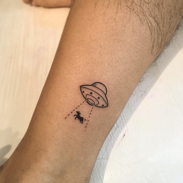 the beauty and meaning of minimalist tattoo style ovini ufo