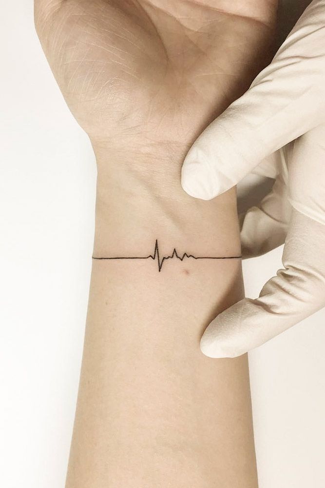 the beauty and meaning of minimalist tattoo style cardiogram