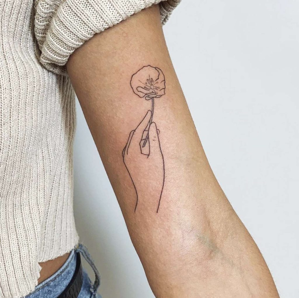 the beauty and meaning of minimalist tattoo style flor