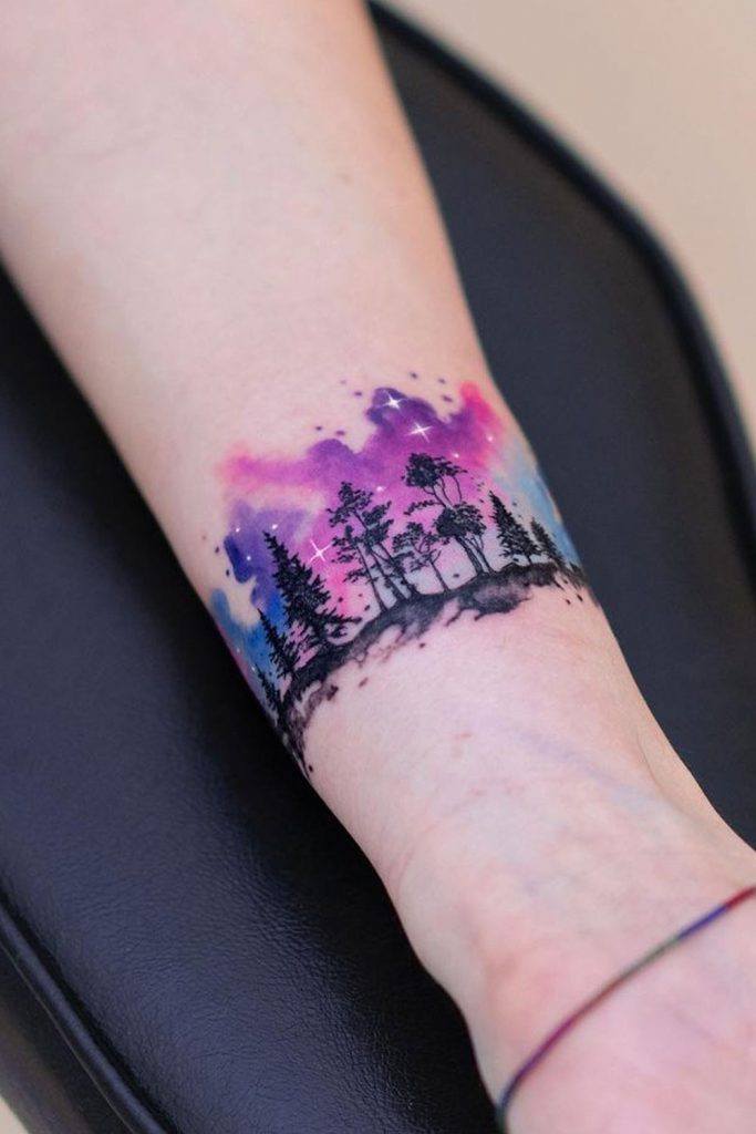 the beauty of watercolor tattoos a unique and artistic style forest