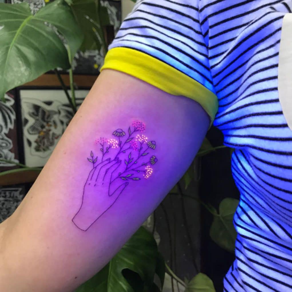 uv tattoos the subtle style with dramatic effect under blacklight flowers