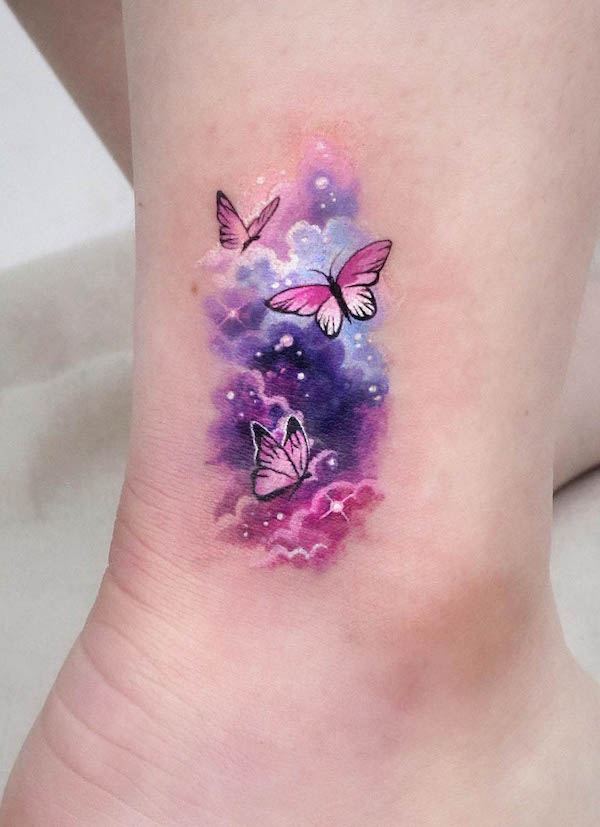 watercolor butterfly and galaxy tattoo